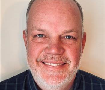 man-with-blue-shirt-and-white-beard-close-up-picture